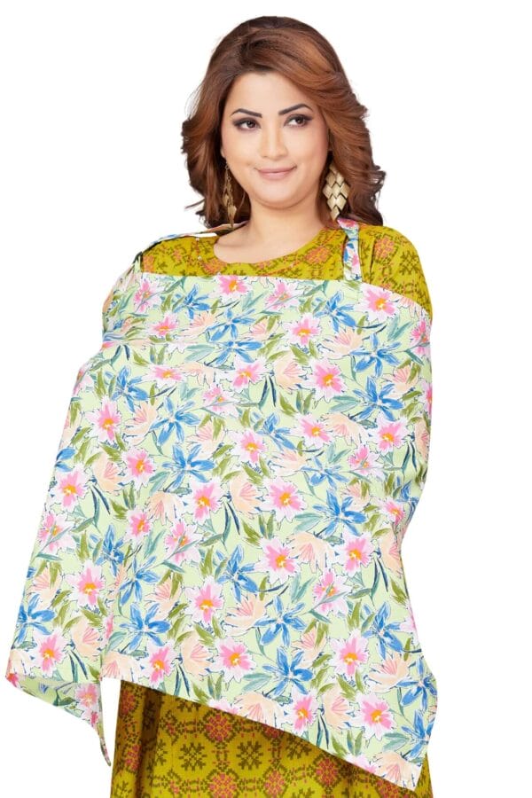 Mother wearing Babywish pastel floral cotton nursing cover during breastfeeding