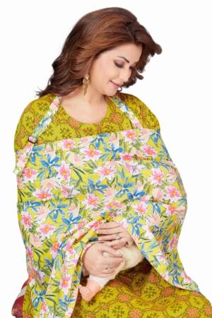 Mother using Babywish floral cotton nursing cover while breastfeeding