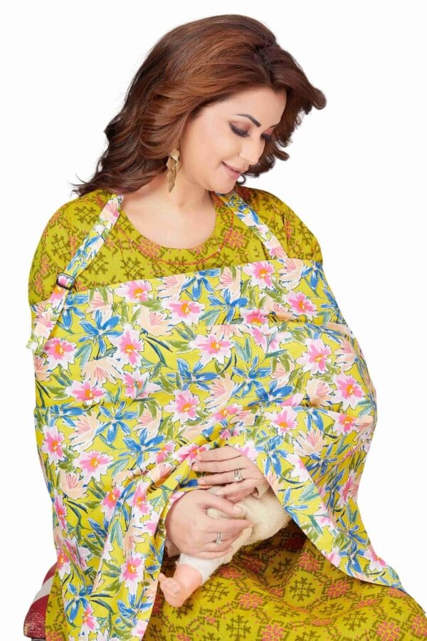 Mother using Babywish floral cotton nursing cover while breastfeeding
