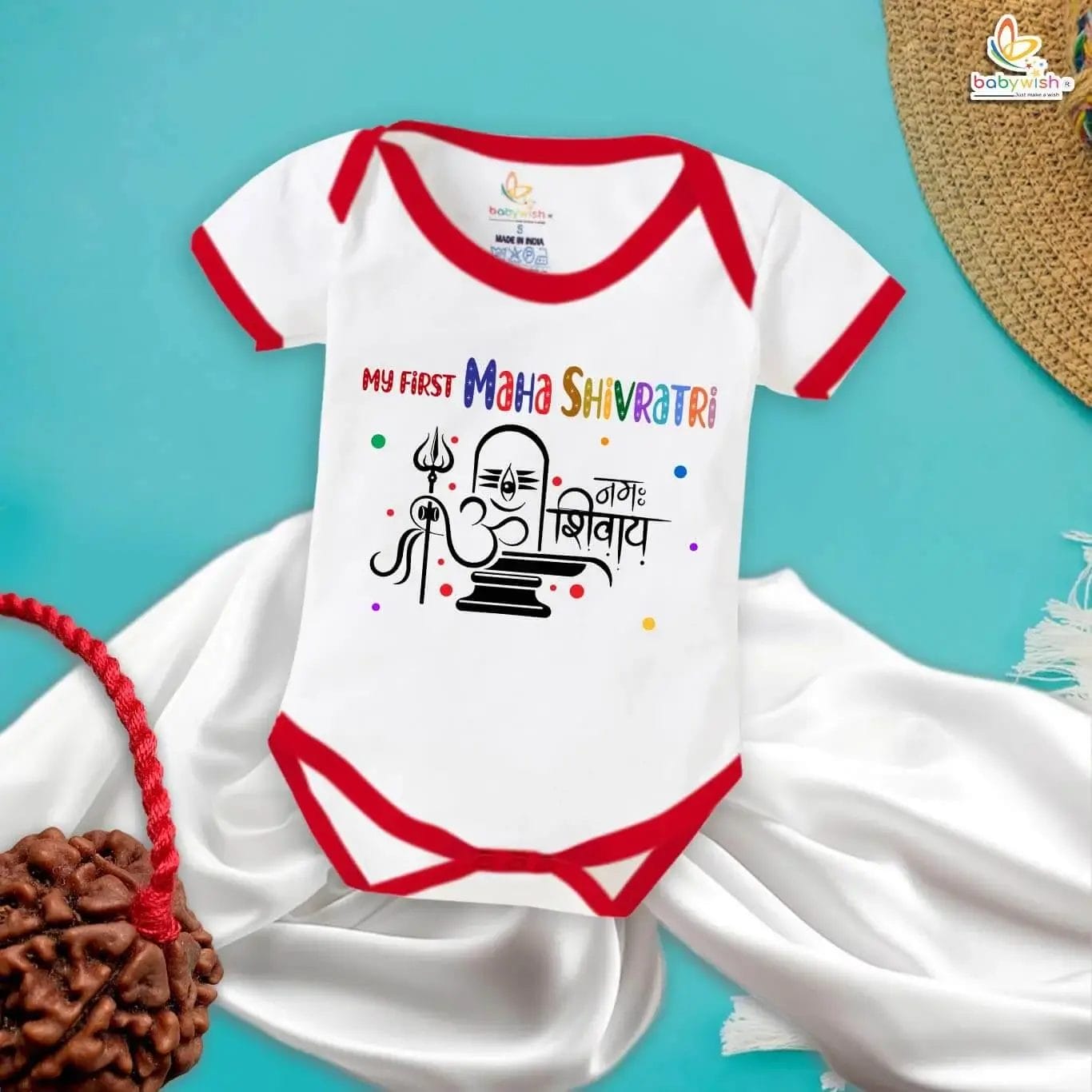 Baby wearing "Om Namah Shivay" romper for first Mahashivratri