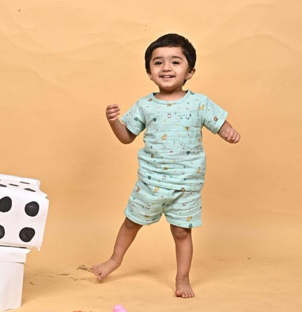 Baby wearing Babywish organic muslin jhabla top and shorts set